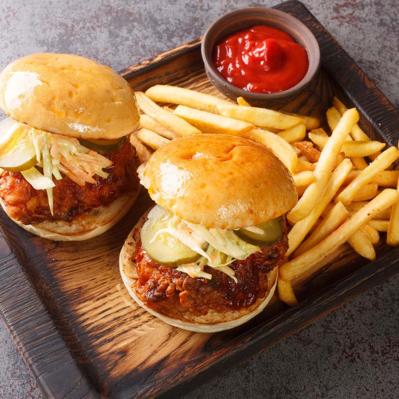 Two Jordan's Hot Dogs & Mac sliders with coleslaw and pickles, served with fries and ketchup.